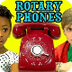 kids react to a rotary phone