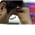 Sensex ends over 70 points lo